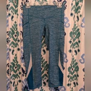 Teal Champion workout capris with thigh pocket